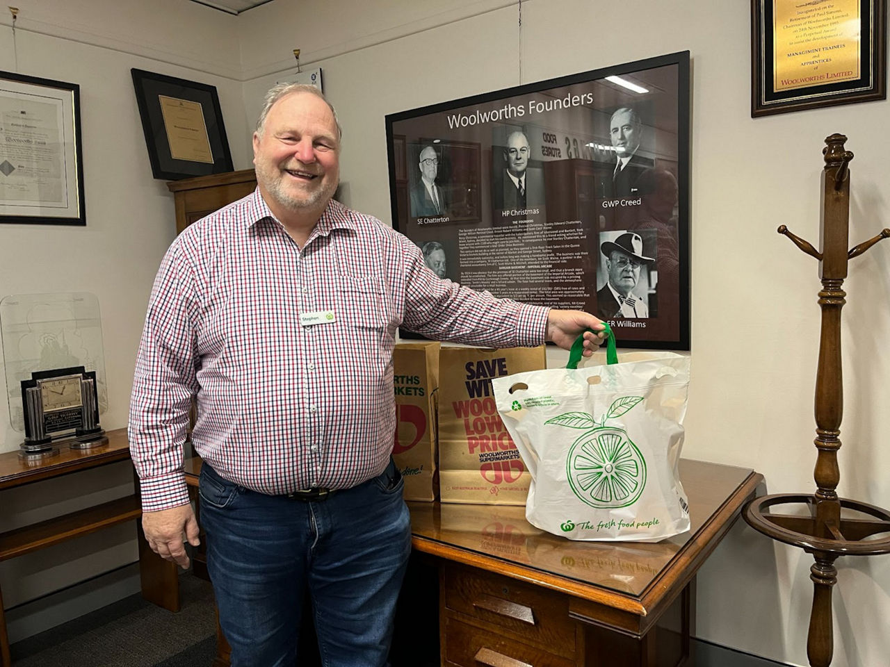 Woolworths Historian Stephen Ward inducting a soft plastic shopping bag into the Woolworths archives