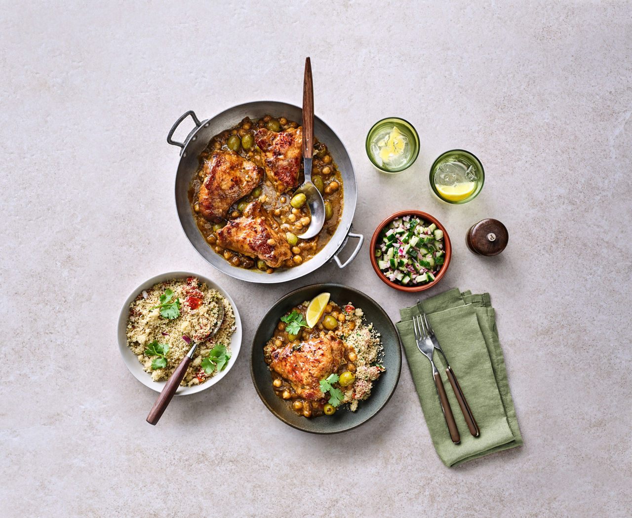 Chicken tagine dish and sides on bench