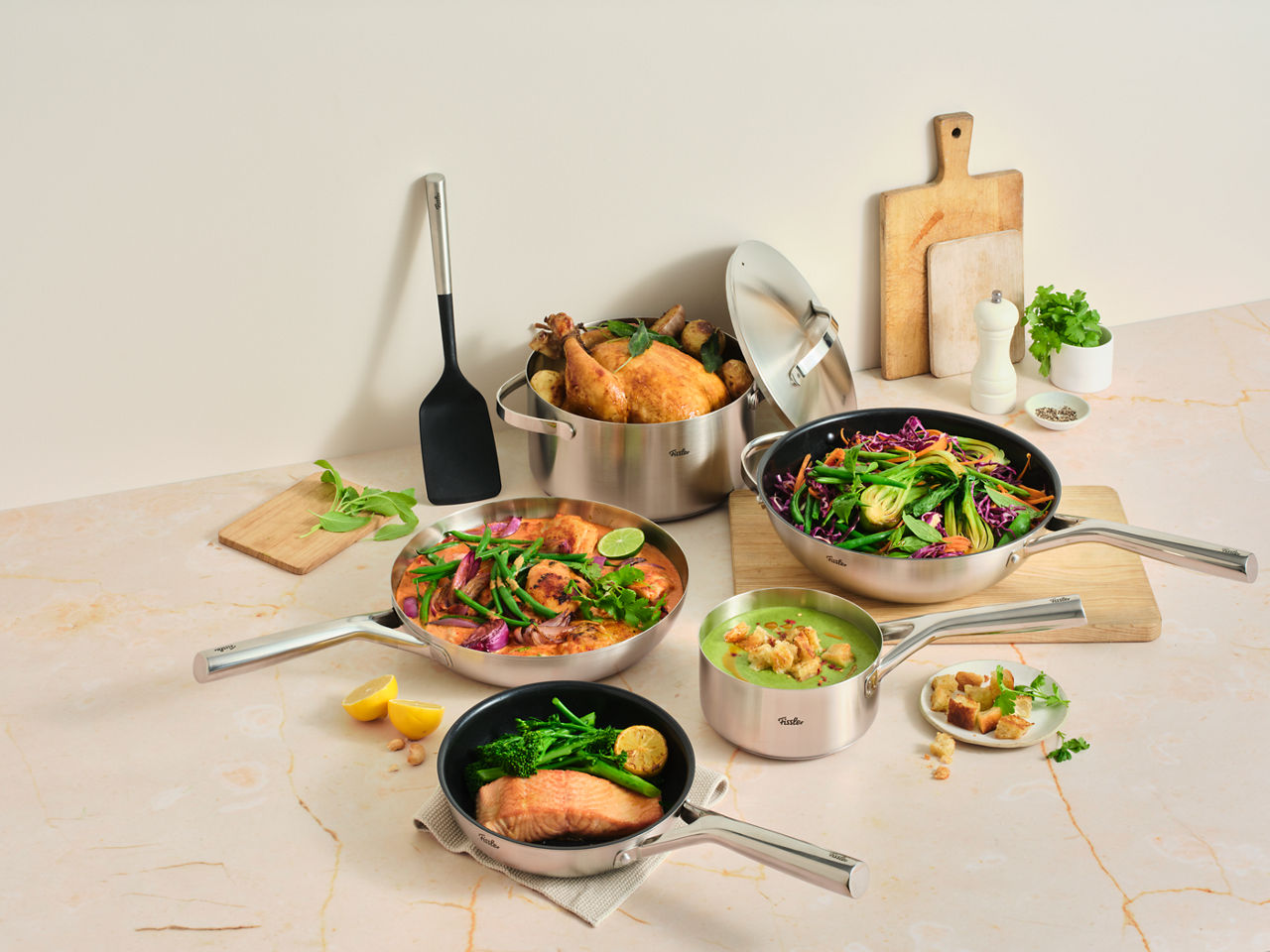 Fissler premium stainless steel cookware on a kitchen bench