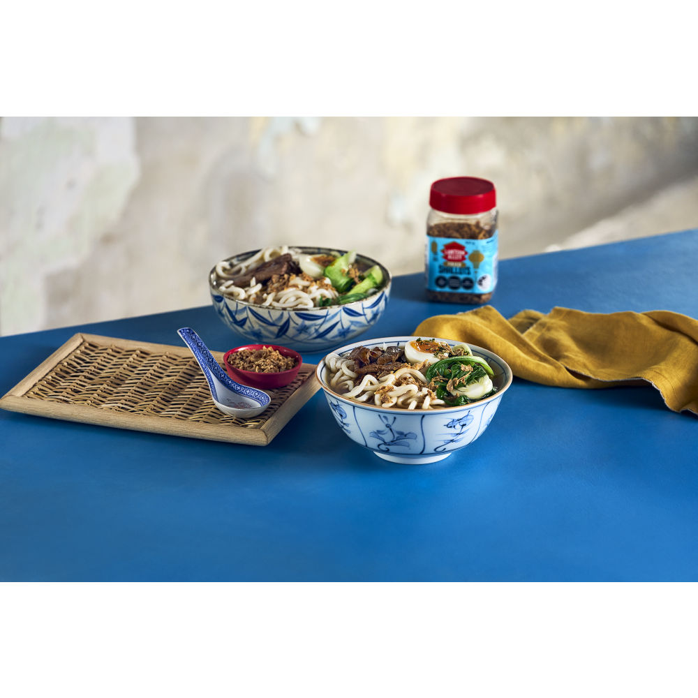 Asian noodle salad and products on a table