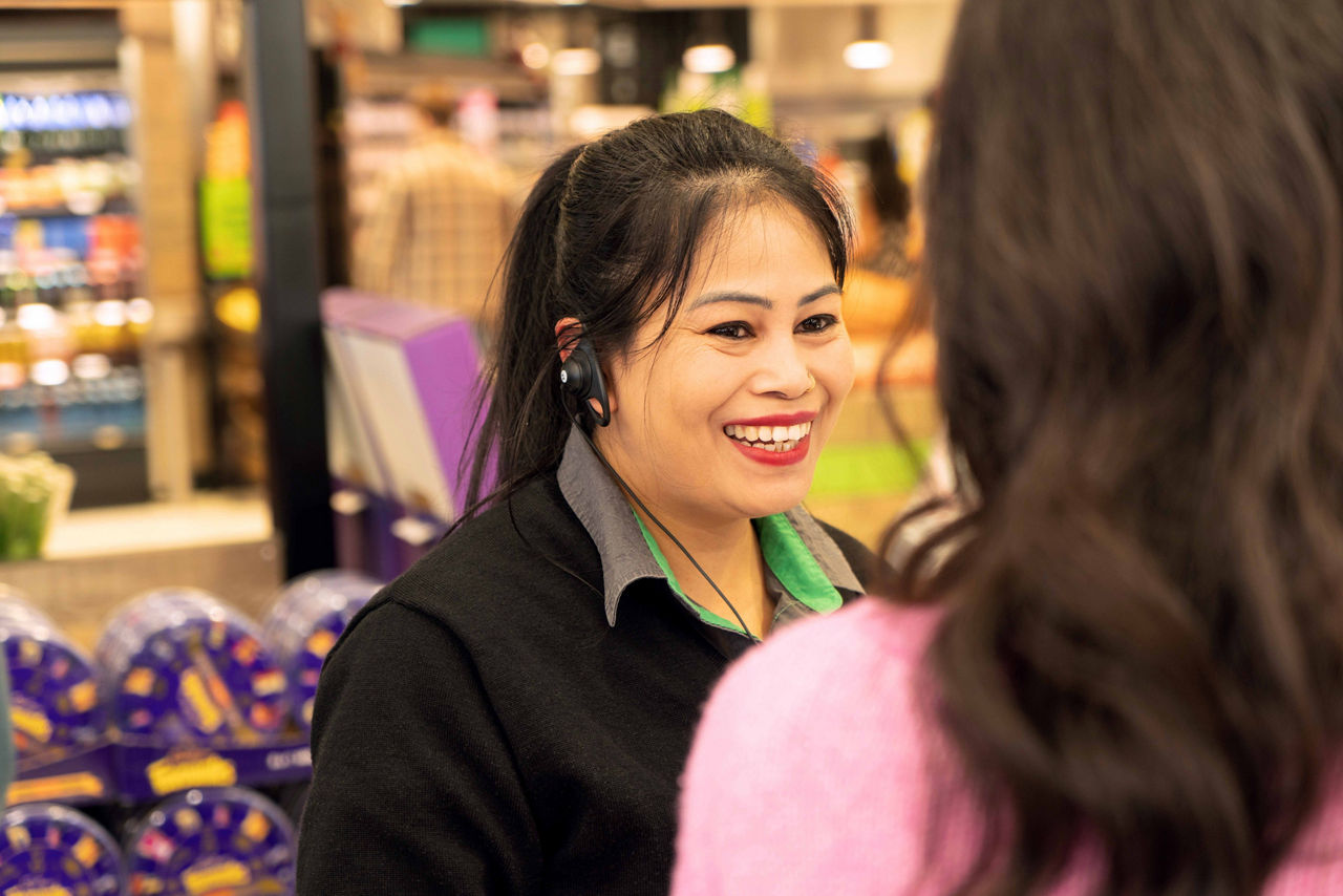 Team member wearing push to talk radio