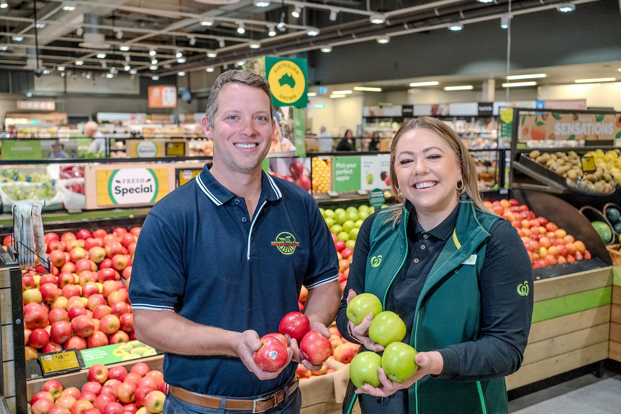 Photo of Ben Joyce from Joyson Orchard and Elisha Moore from Woolworths